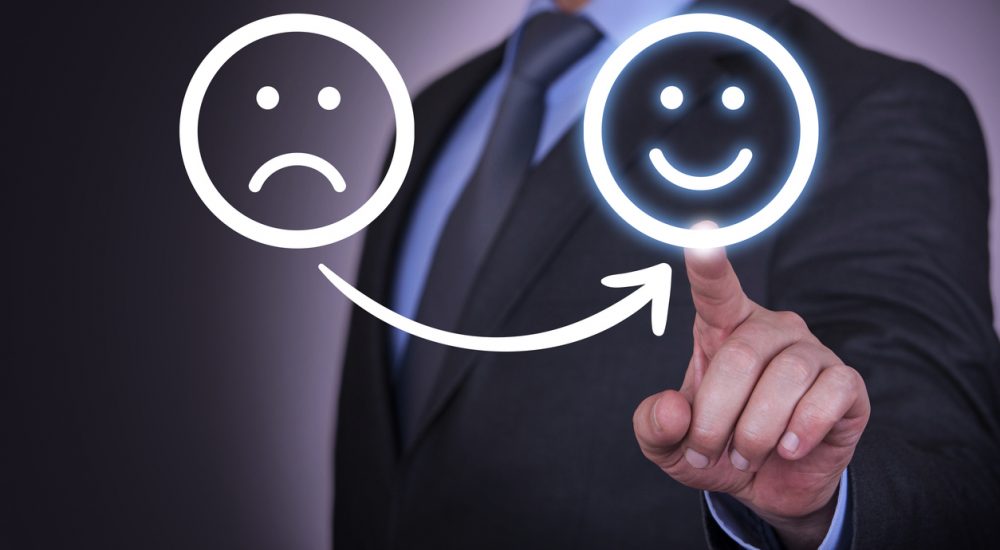 Unhappy and Happy Smileys on Touch Screen